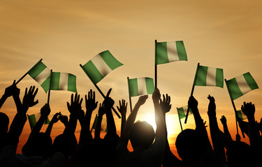 Group of People Waving Flag of Nigeria - obrazy, fototapety, plakaty