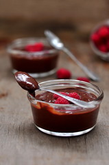 Chocolate mousse with raspberries, selective focus