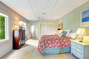 Bright simple bedroom with colofrul bed