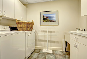 Simple laundry room with old washer and dryer