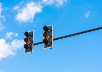 image of traffic light, the amber light is lit. symbolic  for wa