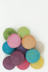 colorful macaroons on white background