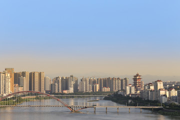 Fototapeta na wymiar modern city near the river