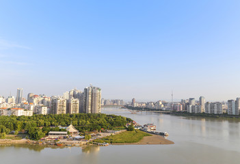 Fototapeta na wymiar modern city near the river