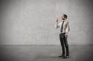 Businessman holding a glass