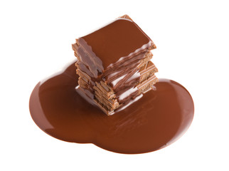 pouring chocolate on chocolate bar