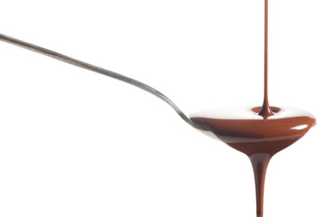 Chocolate poured into a spoon