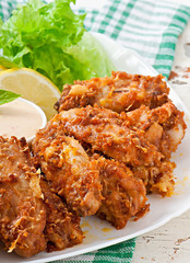 Chicken wings with parmesan cheese in the oven