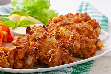 Chicken wings with parmesan cheese in the oven