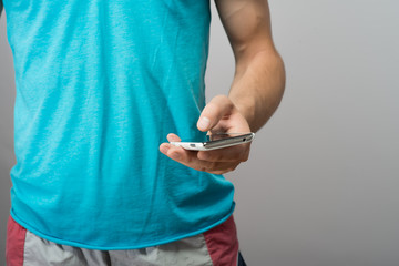 Close up of a man using mobile smart phone