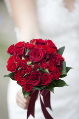 wedding bouquet of red roses and leaves