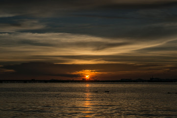 Fototapeta na wymiar silhouette of Laem Chabang seaside at Sriracha with sunset sky