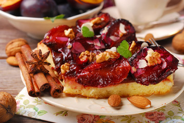 piece of plum cake with nuts and spices