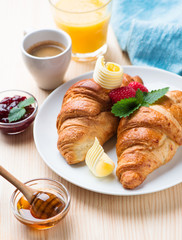 breakfast with croissants,coffee and juice