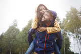 Happy time for loving couple in rain
