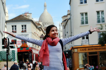 Happy beautiful girl on Montmartre in Paris