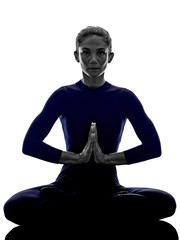 woman exercising Padmasana lotus pose yoga silhouette