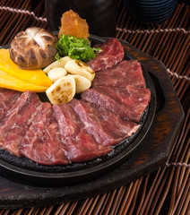 japanese cuisine. beef cube on the background