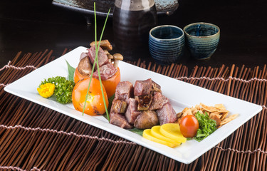 japanese cuisine. beef cube on the background