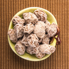 Salted Plum Tamarind Food Snack on a Background