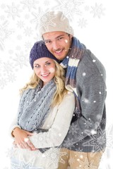 Attractive couple in winter fashion hugging