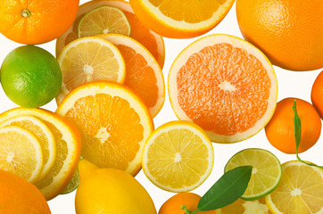 Vitamin C Overload, Stacks of sliced fruit isolated on white