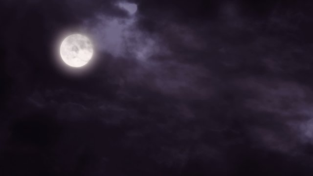Full moon and clouds dark night sky
