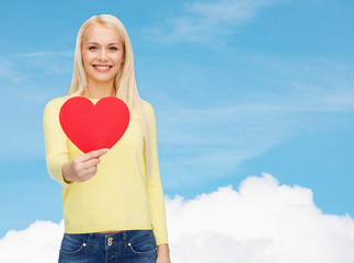 smiling woman with red heart