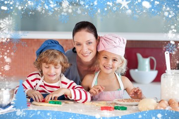 Happy mother baking with her children