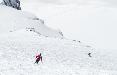 skiers and snow