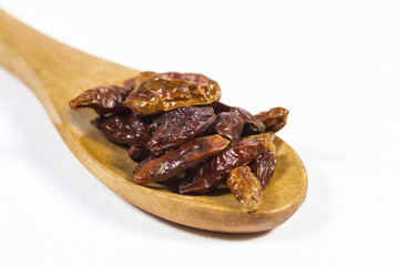 Dried chili in a spoon