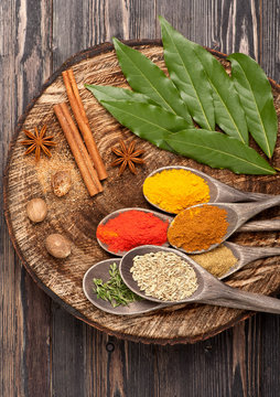Spices and herbs Over Wood. Cuisine ingredients.