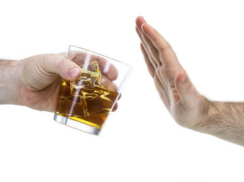 hand reject a glass of whisky