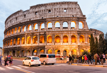 Fototapeta na wymiar ROME - NOVEMBER 2, 2012: Tourists enjoy Colosseum at night. More