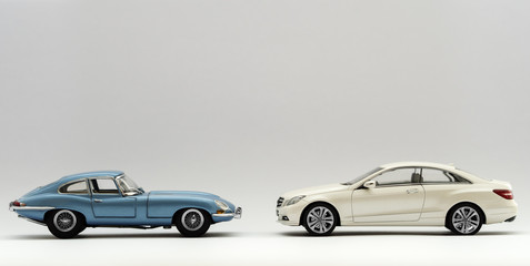 Blue and White Classic Retro and Modern Sports Cars