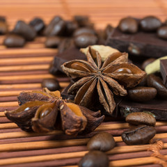 Close up of  spices with chocolate and coffee heap
