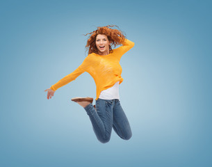 smiling young woman jumping in air