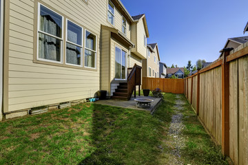 House with small backyard patio area