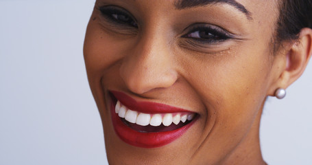 Sexy Black woman smiling and looking at camera