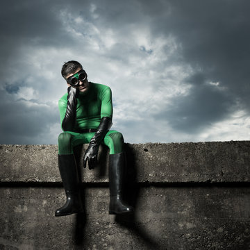 Pensive green superhero