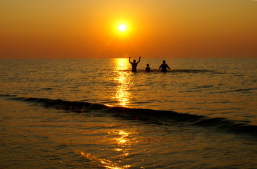 Sport and recreation at the sunrise on the romanian beach