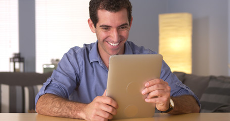 Man using tablet at desk