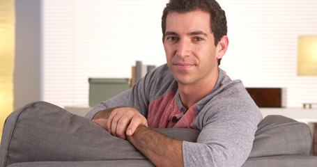 Fototapeta premium Casual man sitting on couch