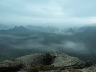 Cold misty blue morning. A minute before sunrise in valley