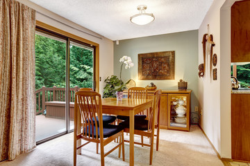 Dining room with walkout deck