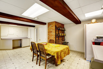 Basement room with dining table