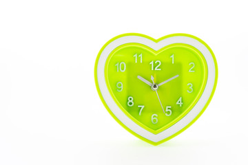 Heart green clock isolated on white background