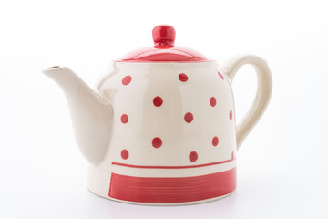 Polka dot tea pot isolated on white background