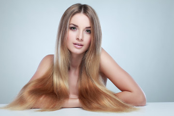 Obraz premium Beautiful girl, on a light background, emotions, cosmetics