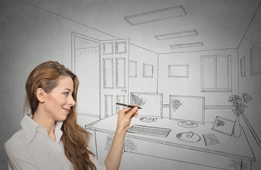 woman designer drawing with pen, pencil future apartment